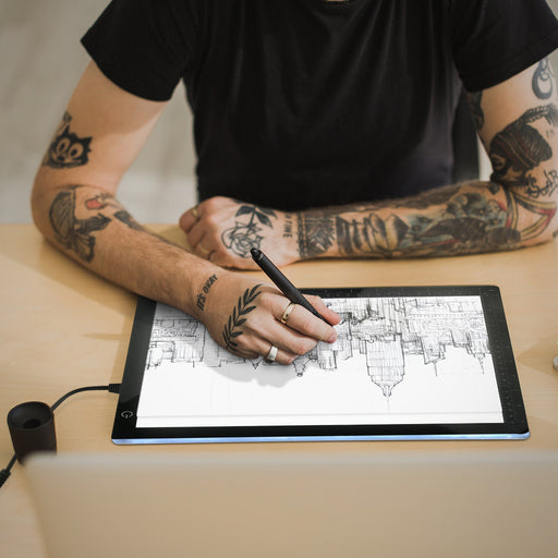 man using xtralite led light box